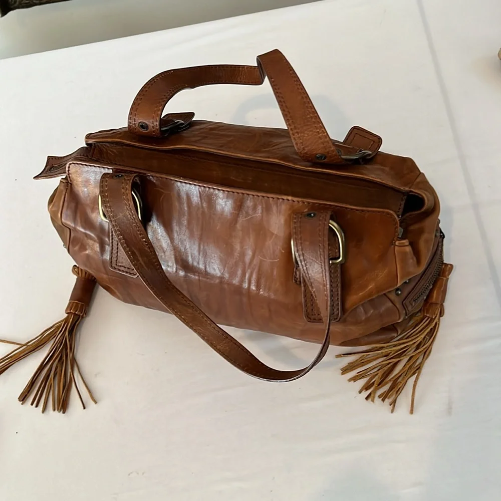 Capacciou large brown Leather bag  side zip pockets 2  long leather tassels